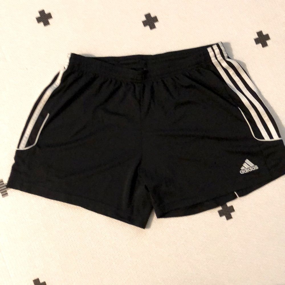 Used size Large women’s Adidas Climate shorts. Fabric a little fringed on L leg.